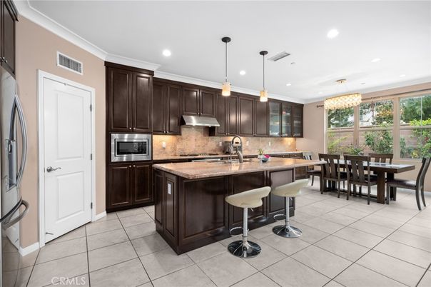 Chandelier, Dining room, Interior, Kitchen, Pendant Lights, Recessed Lighting, Stainless Steel Appliances