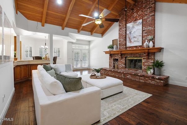Chandelier, Fireplace, Interior, Living room, Recessed Lighting, Stone Walls, Wooden Beams, Wooden Ceilings, Wood Texture Flooring