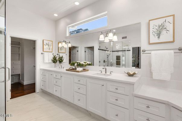 Bathroom, Dual Sink Vanities, Glass Shower, Interior, Marble, Recessed Lighting, Wood Texture Flooring