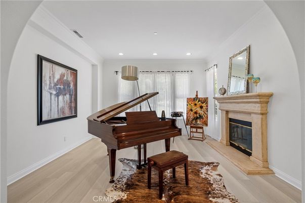 Fireplace, Interior, Piano, Recessed Lighting, Wood Texture Flooring