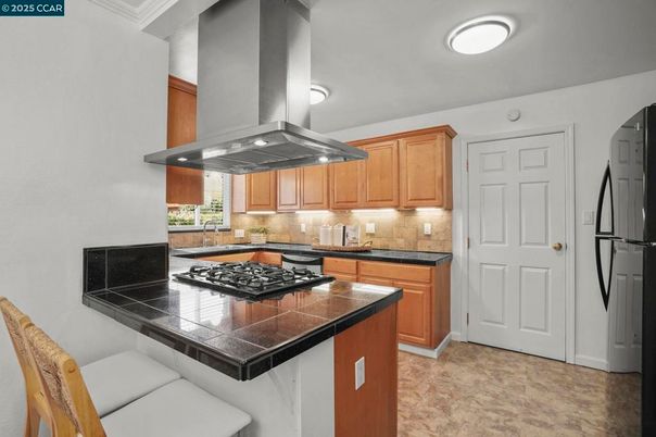Interior, Kitchen, Recessed Lighting, Tile Countertops