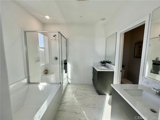 Bathroom, Dual Sink Vanities, Glass Shower, Interior, Marble, Recessed Lighting