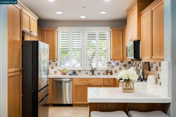 Interior, Kitchen, Recessed Lighting, Stainless Steel Appliances, Tile Countertops