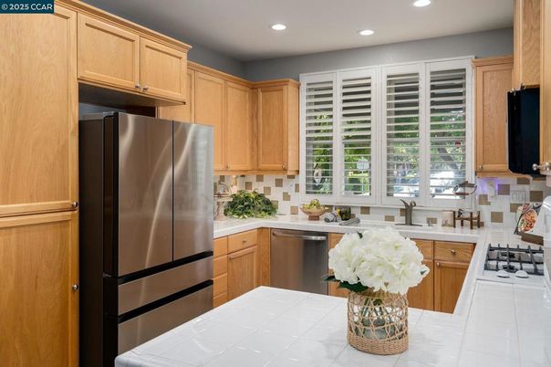 Interior, Kitchen, Recessed Lighting, Stainless Steel Appliances, Tile Countertops