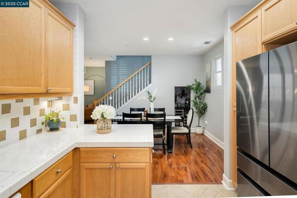 Dining room, Interior, Kitchen, Recessed Lighting, Tile Countertops, Wood Texture Flooring