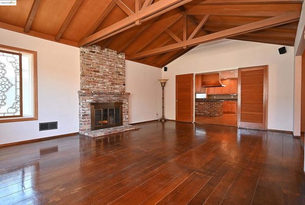 Empty room, Fireplace, Interior, Kitchen, Stone Walls, Wooden Beams, Wooden Ceilings, Wood Texture Flooring