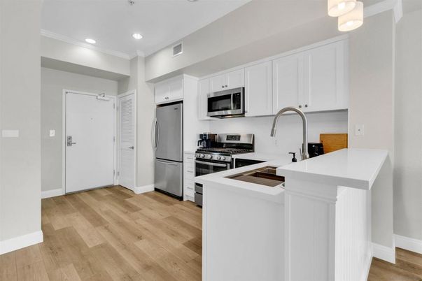 Interior, Kitchen, Recessed Lighting, Stainless Steel Appliances, Wood Texture Flooring