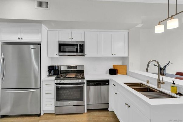Interior, Kitchen, Pendant Lights, Stainless Steel Appliances, Wood Texture Flooring
