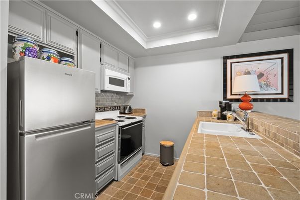 Interior, Kitchen, Recessed Lighting, Tile Countertops