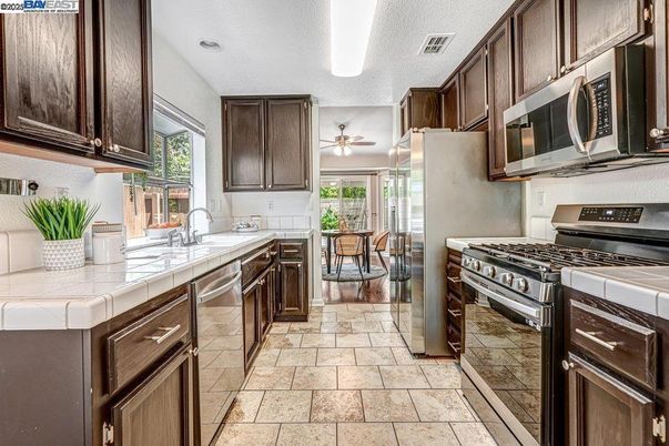 Dining room, Interior, Kitchen, Stainless Steel Appliances, Tile Countertops
