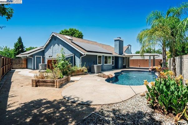 Exterior, Pool, Solar Panels