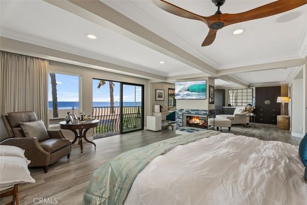 Bedroom, Fireplace, Interior, Recessed Lighting, Water, Wood Texture Flooring