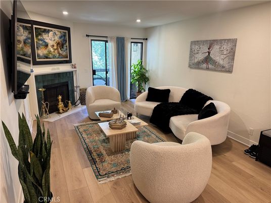 Fireplace, Interior, Living room, Recessed Lighting, Wood Texture Flooring