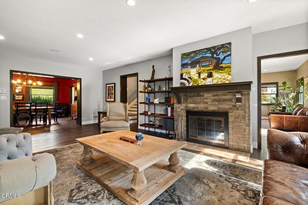 Dining room, Fireplace, Interior, Living room, Pendant Lights, Recessed Lighting, Wood Texture Flooring