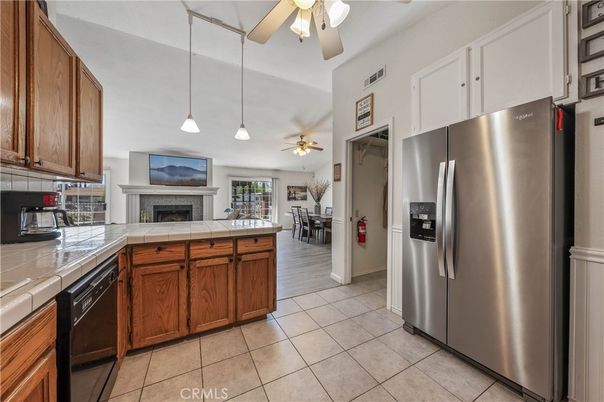 Dining room, Fireplace, Interior, Kitchen, Pendant Lights, Tile Countertops