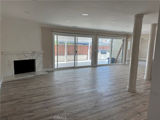 Empty room, Fireplace, Interior, Recessed Lighting, Wood Texture Flooring