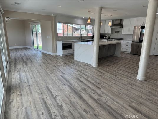 Interior, Kitchen, Pendant Lights, Recessed Lighting, Stainless Steel Appliances, Wood Texture Flooring