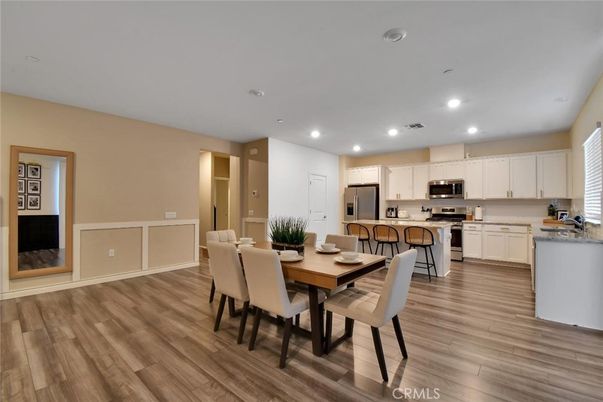 Dining room, Interior, Kitchen, Recessed Lighting, Stainless Steel Appliances, Wood Texture Flooring