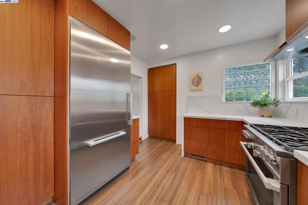 Interior, Kitchen, Recessed Lighting, Stainless Steel Appliances, Wood Texture Flooring