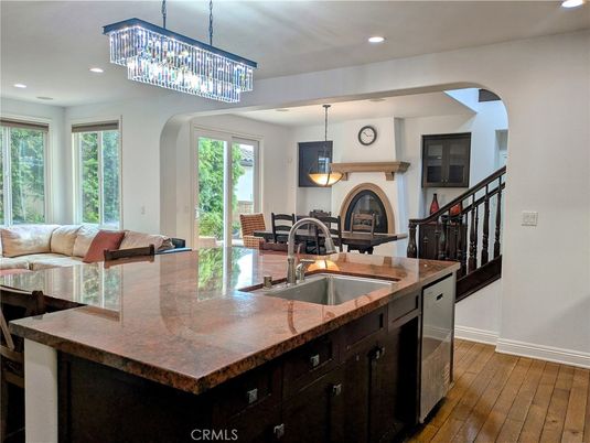 Chandelier, Fireplace, Interior, Kitchen, Pendant Lights, Recessed Lighting, Wood Texture Flooring