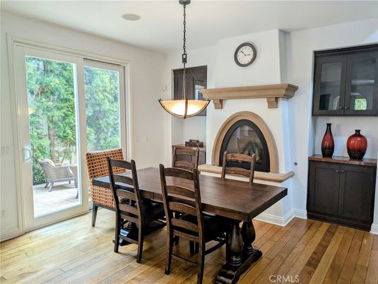 Dining room, Fireplace, Interior, Pendant Lights, Wood Texture Flooring