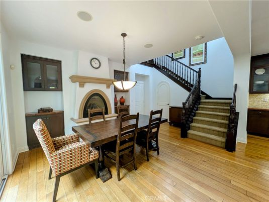 Dining room, Fireplace, Interior, Pendant Lights, Wood Texture Flooring