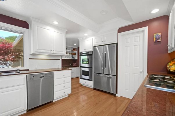 Interior, Kitchen, Recessed Lighting, Stainless Steel Appliances, Wood Texture Flooring