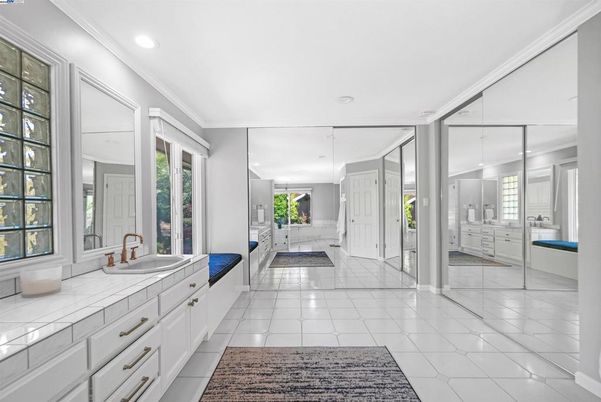 Bathroom, Dual Sink Vanities, Interior, Recessed Lighting, Tile Countertops