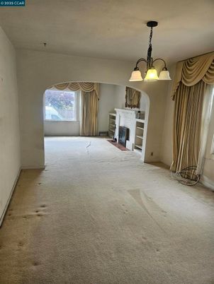 Chandelier, Empty room, Fireplace, Interior