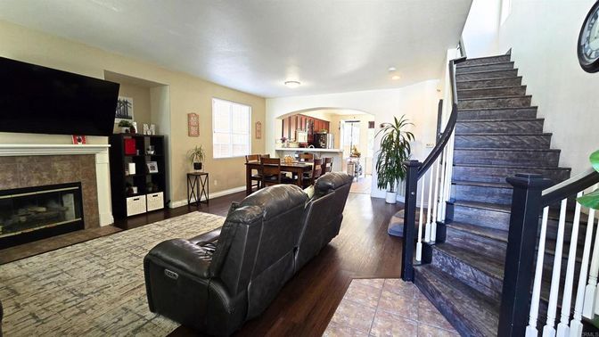 Dining room, Fireplace, Interior, Living room, Recessed Lighting, Wood Texture Flooring