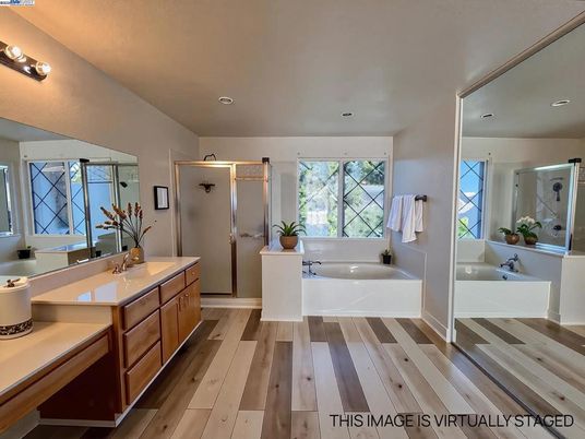 Bathroom, Dual Sink Vanities, Glass Shower, Interior, Recessed Lighting, Wood Texture Flooring