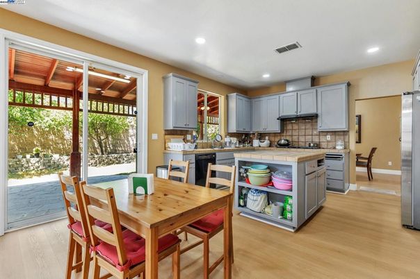 Dining room, Interior, Kitchen, Recessed Lighting, Tile Countertops, Wood Texture Flooring