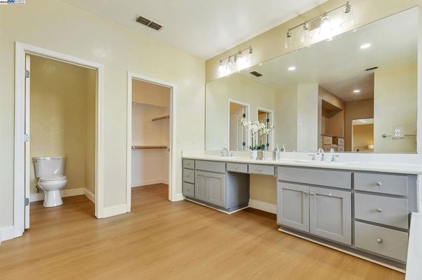 Bathroom, Dual Sink Vanities, Interior, Recessed Lighting, Wood Texture Flooring