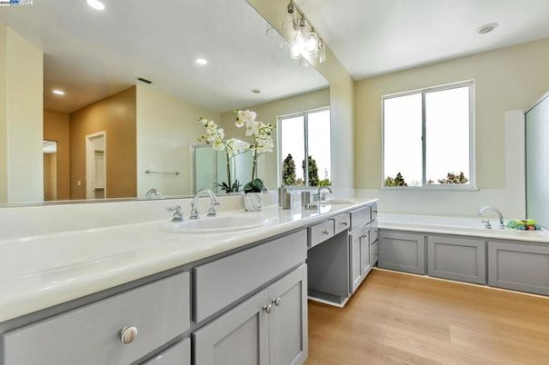 Bathroom, Dual Sink Vanities, Interior, Recessed Lighting, Wood Texture Flooring