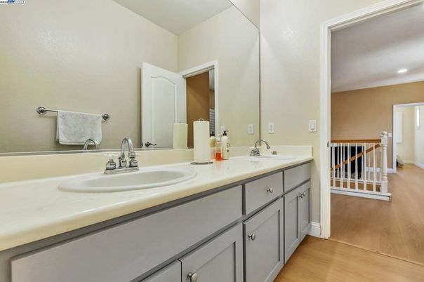 Bathroom, Dual Sink Vanities, Interior, Recessed Lighting, Wood Texture Flooring
