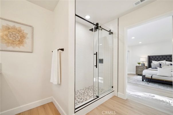 Bathroom, Bedroom, Glass Shower, Interior, Recessed Lighting, Wood Texture Flooring