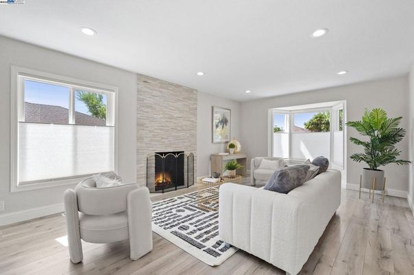 Fireplace, Interior, Living room, Recessed Lighting, Stone Walls, Wood Texture Flooring