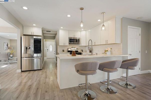 Interior, Kitchen, Pendant Lights, Recessed Lighting, Stainless Steel Appliances, Wood Texture Flooring