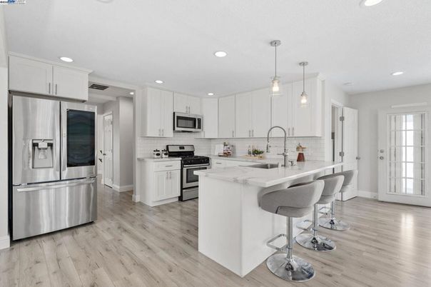 Interior, Kitchen, Pendant Lights, Recessed Lighting, Stainless Steel Appliances, Wood Texture Flooring