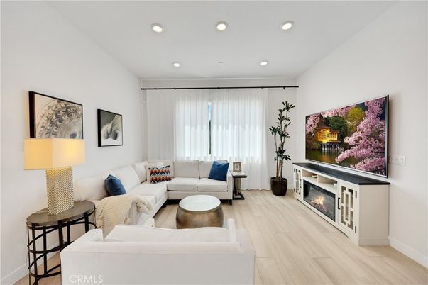 Fireplace, Interior, Living room, Recessed Lighting, Wood Texture Flooring