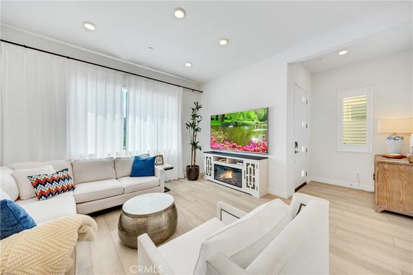 Fireplace, Interior, Living room, Recessed Lighting, Wood Texture Flooring