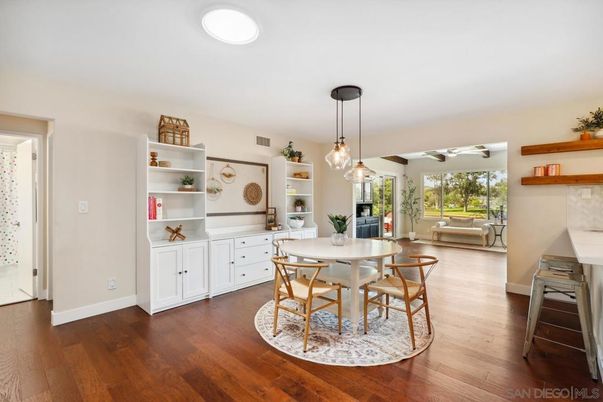 Dining room, Fireplace, Interior, Pendant Lights, Wood Texture Flooring