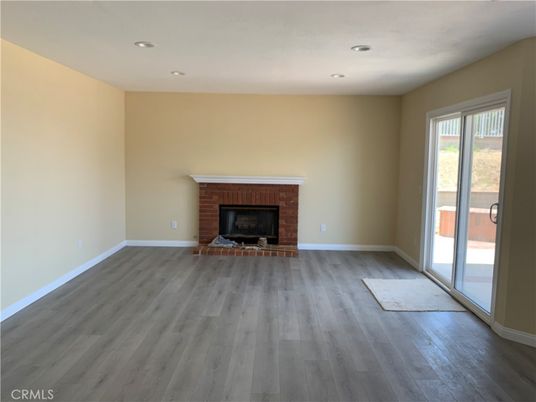 Empty room, Fireplace, Interior, Recessed Lighting, Wood Texture Flooring