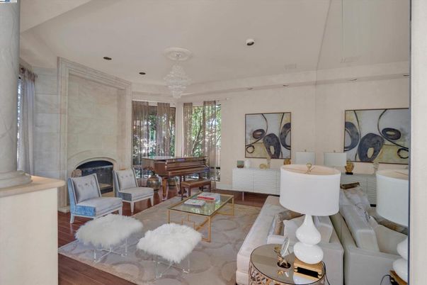 Fireplace, Interior, Living room, Piano, Recessed Lighting, Wood Texture Flooring