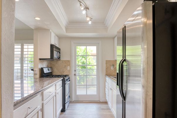 Interior, Kitchen, Recessed Lighting, Stainless Steel Appliances, Wood Texture Flooring