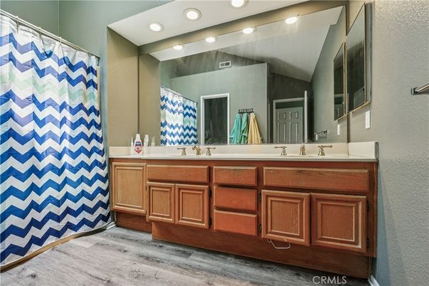 Bathroom, Dual Sink Vanities, Interior, Recessed Lighting, Wood Texture Flooring
