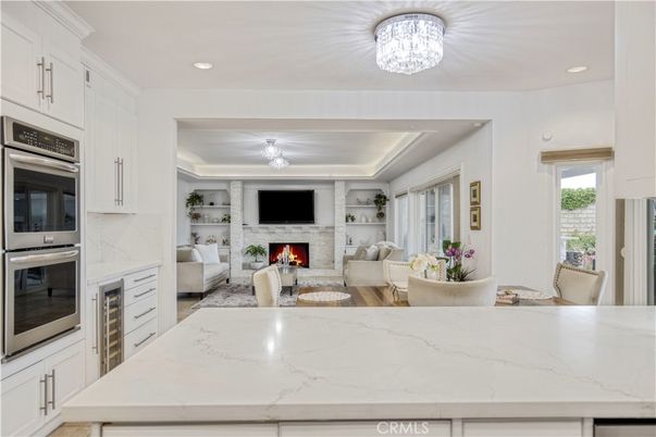 Dining room, Fireplace, Interior, Kitchen, Living room, Recessed Lighting, Stainless Steel Appliances