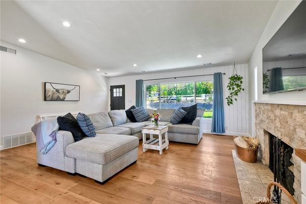 Fireplace, Interior, Living room, Recessed Lighting, Wood Texture Flooring