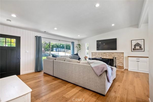 Fireplace, Interior, Living room, Recessed Lighting, Wood Texture Flooring