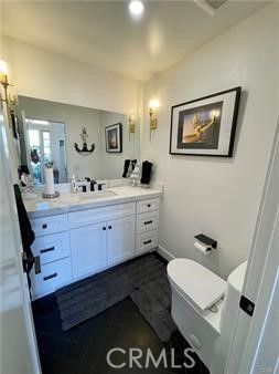 Bathroom, Dual Sink Vanities, Interior, Recessed Lighting, Wood Texture Flooring
